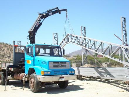 Camiones 750 con brazo hidraulico en Cabecera provincial, La Vega, República Dominicana